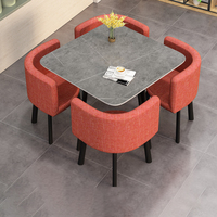Table à Manger Ronde Moderne et Luxueuse Comprenant Quatre Chaises et une Table Basse au Design Décontracté et Gain de Place