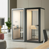 Cabine téléphonique insonorisée en acier avec porte vitrée, éclairage LED et bureau pour espace de travail d'entreprise