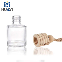 Bouteilles de parfum suspendues rondes vides personnalisées de 8 ml pour voiture, de luxe et rechargeables - MOQ 10000 pièces