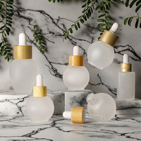 Luxe 30ml sphérique soins de la peau Essence bouteille ronde fond épais petite ampoule voyage verre compte-gouttes givre pour l'aromathérapie