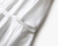 Peignoir d'hôtel unisexe 100 % coton avec tissage gaufré, style kimono, élégant, longueur genou, printemps, ODM, logo frontal