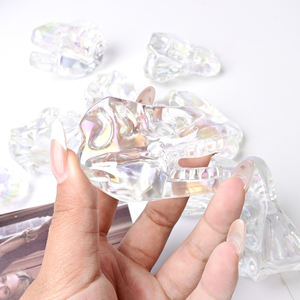 Crânes de dinosaures Aura de haute qualité en gros, 5,7 cm, en cristal poli sculpté, pour la tendance mode, la décoration intérieure unique et les fêtes - Product Image 1