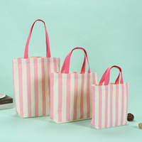 Sac fourre-tout professionnel en nylon noir classique avec logo personnalisé, fermeture éclair cousue, imprimé par transfert thermique, forme personnalisée, sac à cosmétiques