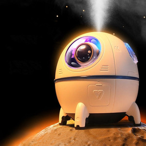 Humidificador Ultrasónico con Forma de Astronauta y Nave Espacial, Regalo Elegante y Popular de 2023, con Luz Ambiental Deslumbrante - Product Image 1