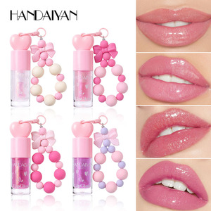 Low MOQ Heart Keychain Lip Gloss <b>No</b> <b>Logo</b> Ready To Ship Clear Glitter Jelly Lipgloss With Y2K Beaded Charm Bulk - Product Image 1