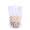 Sac d'emballage de jus de gelée en plastique réutilisable transparent avec impression de logo personnalisé sac d'emballage debout pour boisson lait vin pochette à bec verseur