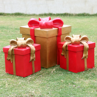 Sculpture géante de chapeau de Père Noël en fibre de verre, grandes statues de boîtes cadeaux de Noël pour centres commerciaux, décoration murale intérieure, photo de vacances
