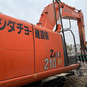 รถขุดมือสอง HITACHI ZX210W พร้อมใช้งาน 100% รถขุดไฮดรอลิกแบบล้อ ประหยัดน้ำมัน แรงสูง - Product Image 1