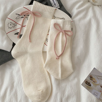 Chaussettes en laine chaudes d'hiver pour femmes, style preppy avec nœud, chaussettes amples, chaussettes mi-mollet mignonnes de mode coréenne, vente en gros