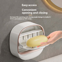 Porte-savon mural moderne et élégant, best-seller, boîte de rangement à savon pliable de luxe avec design de drainage et boucle adhésive