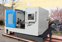 Centre de tournage CNC Fanuc DL TCK65 à banc incliné, mono-broche, moyen portance, avec chargeur de barres pour l'usinage des métaux