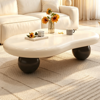Table basse en forme de nuage irrégulière avec pieds sphériques, style moderne minimaliste, table de décoration rustique pour salon