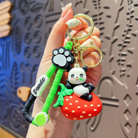 Porte-clés en silicone mignon en forme de panda - Breloque de sac animalier de dessin animé avec motifs bambou/chef/fraise (plusieurs styles)