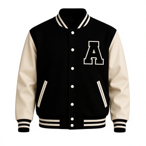 Chaqueta Varsity Negra y Crema Personalizada para Hombre, Cuerpo de Lana con Mangas de Cuero PU, Cierre de Botones a Presión, Cuello y Puños Acanalados - Product Image 1