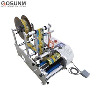Machine d'étiquetage d'autocollant de bouteille de rouleau de bouteille semi-automatique professionnelle de haute qualité applicateur d'étiquettes de petite bouteille