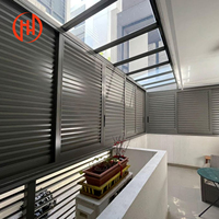 Store banne motorisé fixe en aluminium résistant aux intempéries pour façades