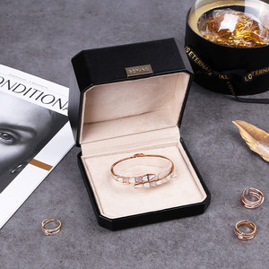 Boîte à bijoux en cuir PU avec charnière en plastique noire octogonale de petite taille personnalisée Boyang - Product Image 1