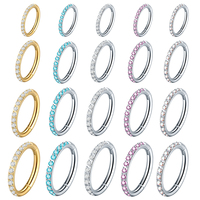 Vente en gros de anneaux d'oreille segmentés à charnière en acier chirurgical 316L pour septum nasal, avec zircon pavé orienté vers l'extérieur
