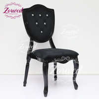 Chaise de salle à manger noire de luxe gothique moderne en gros, dossier bouclier à boutons en cristal, chaises de mariage en velours noir de style français pour hôtel