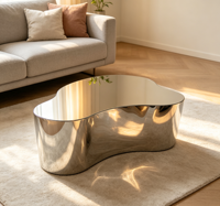 Table basse moderne de luxe léger, minimaliste, avec plateau miroir irrégulier, durable, en acier inoxydable argenté, pour salon et chambre