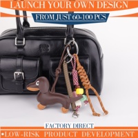 Breloque de sac en PU Chien Teckel, Personnalisation de cadeaux, Faible MOQ pour sacs à dos, Articles pour foire à thème animalier, Stock de magasin de souvenirs