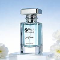 Botol Parfum Kaca Persegi Bahu Datar 50ml Mewah dengan Pompa Semprot, Warna Bening, Desain Baru KEYO, Tutup Perak Shanghai PGB-CD-015