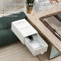 Vente en gros de flacons carrés en verre transparent de 15 ml (0,5 oz) avec boîte pour parfum, estampés à chaud, pour huiles essentielles