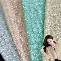 Tissu en tweed uni à paillettes en polyester, adapté aux vêtements, aux sacs, aux accessoires, aux jouets, etc., peut être expédié immédiatement