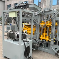 Ligne de production de briques en béton entièrement automatique et hydraulique Zhongke QT4-15 pour la fabrication de blocs