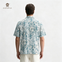Chemise de vacances légère et respirante pour homme, 100 % coton, motif floral abstrait bleu ardoise, style cubain, 120 g/m², idéale pour les resorts (ODM)