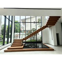 Escalier intérieur personnalisé durable en pierre naturelle et acier inoxydable, écologique, empilé, moderne, avec garde-corps en verre de luxe pour appartement et hôtel