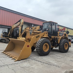 Chargeuse sur pneus CAT 966H d'occasion bien entretenue, 22 tonnes, Caterpillar, fiable pour le chargement en carrière et en construction - Product Image 1
