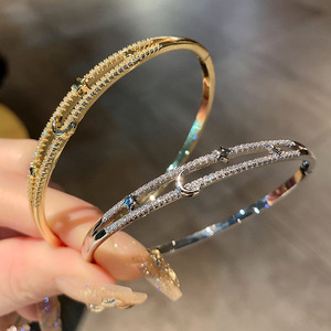 Pulsera de circonita con estrella y luna en oro y plata, microincrustada, para mujer, joyería de aniversario, pulseras unisex de moda. - Product Image 1