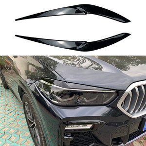 BMW X5 X6 G05 G06 2019+ สติ๊กเกอร์ตกแต่งคิ้วไฟหน้า สีดำเปียโน ABS สติ๊กเกอร์ติดตัวถัง - Product Image 1