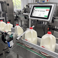 Imprimante jet d'encre TIJ en ligne avec convoyeur pour l'impression de dates sur cartons, plastique et métal pour usine