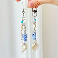 Colgante de concha de cerámica con forma de pez, cadena para teléfono móvil, llavero, estilo Ins, colgante para bolso con concha marina y estrella de mar, colgante para bolso hecho a mano con temática oceánica y cuentas