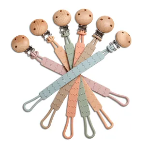 Vente en gros de Clips de sucette multicolores sans BPA, chaîne de dentition en Silicone pour bébé, Clips de sucette en bois pour enfants