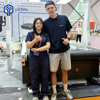Yuchen CE gecertificeerde CNC-machine voor het snijden van schuim, carbon fiber prepreg, vlakbedplotter met automatische ophaal.
