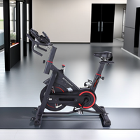 Vélo d'appartement professionnel réglable en acier à résistance magnétique pour usage domestique