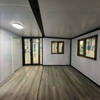 Maison conteneur moderne extensible avec finitions préfabriquées écologiques et étanches, alimentée à l'énergie solaire pour applications en cour et en salle à manger
