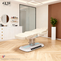 Lit de beauté électrique de luxe avec base LED, lit de massage en cuir, lit de soin du visage et des cils avec éclairage pour esthéticienne