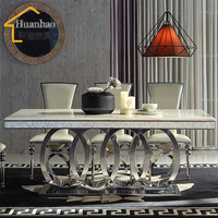 Ensemble de table à manger longue réglable en acier inoxydable doré pour 8 personnes avec plateau en marbre et chaises, mobilier de salle à manger moderne