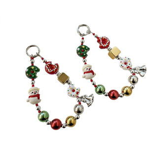 ¡Dios Mío! Esta Cadena para Teléfono con Forma de Donut de Muñeco de Nieve se Está Volviendo Tan Adorable - Product Image 4