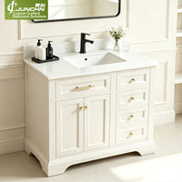 Meuble-lavabo de salle de bain en marbre, style américain traditionnel, avec vasque simple, armoire à panneaux surélevés laquée bleu foncé, dimensions personnalisées