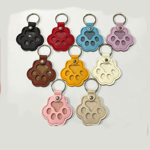 Creative Gifts Cartoon Cat Puppy Paw Shape PU Leather <b>pet</b> hair <b>memorial</b> storage bag Dog Hair Collector - Product Image 1