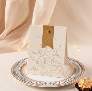 New cream-white <b>wedding</b> candy <b>box</b> with a retro French-style hand-held champagne-colored bow texture candy <b>box</b> design - Product Image 4