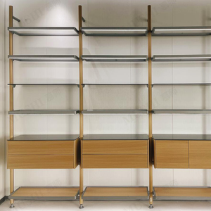 Gabinete de cajón de madera de decoración moderna universitaria, estantes de vidrio inclinados, poste redondo de acero dorado, estantes para libros colgantes de pared - Product Image 1