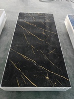 Panel de Mármol Negro Dorado con Patrones de Vetas Doradas Fluidas para Instalación en Paredes Decorativas
