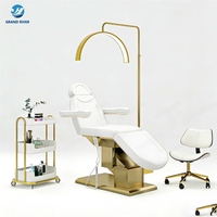 Chaise de soin du visage inclinable à 3 moteurs en acier inoxydable avec base dorée, table de massage et lit de salon de beauté de luxe à vendre