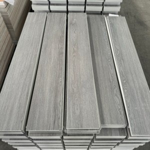 Vente en gros de planches de vinyle rigides Unilin Click de 5 mm, 100% imperméables, revêtement de sol SPC pour projets commerciaux - Product Image 2